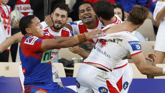 WOLLONGONG, AUSTRALIA - APRIL 17: Tyson Frizell of the Knights slams Zac Lomax of the Dragons to the ground after a Dragons try during the round six NRL match between the St George Illawarra Dragons and the Newcastle Knights at WIN Stadium, on April 17, 2022, in Wollongong, Australia. (Photo by Mark Evans/Getty Images)