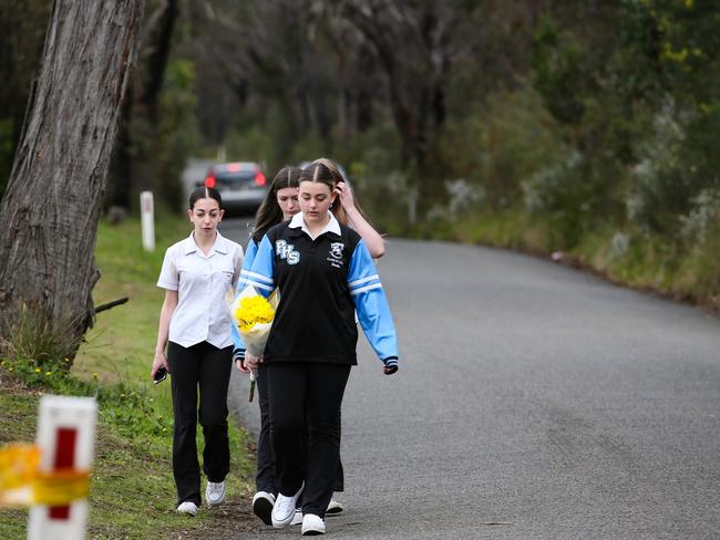 Picton High peers arrived at the crash site before school, clad in the light blue uniforms synonymous with the local school. Picture: NCA Newswire /Gaye Gerard