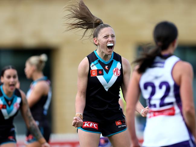 Caitlin Wendland of the Power celebrates kicking her first goal in AFLW. Picture: James Elsby/AFL Photos via Getty Images.