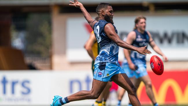 Ishmael Palmer kicks the ball at TIO Stadium for 2023-24 NTFL Men's match between Pint vs Darwin Buffaloes. Picture: Pema Tamang Pakhrin