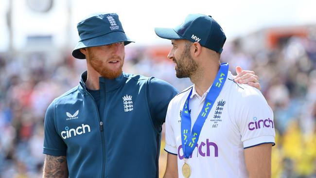 England captain Ben Stokes speaks with man of the match Mark Wood. Photo by Stu Forster/Getty Images.