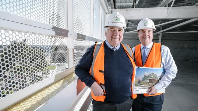 Former Playford Council chief executive Mal Hemmerling and mayor Glenn Docherty in the new carpark. Picture: Morgan Sette/AAP