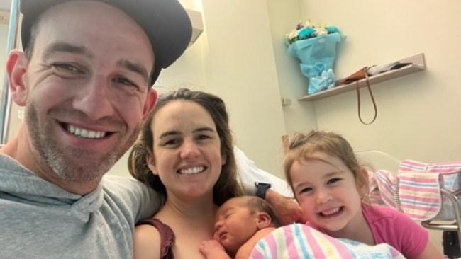 Annie with her husband and children shortly after giving birth to her son. Picture: Supplied