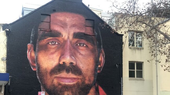 A photo of the well-known Adam Goodes mural.