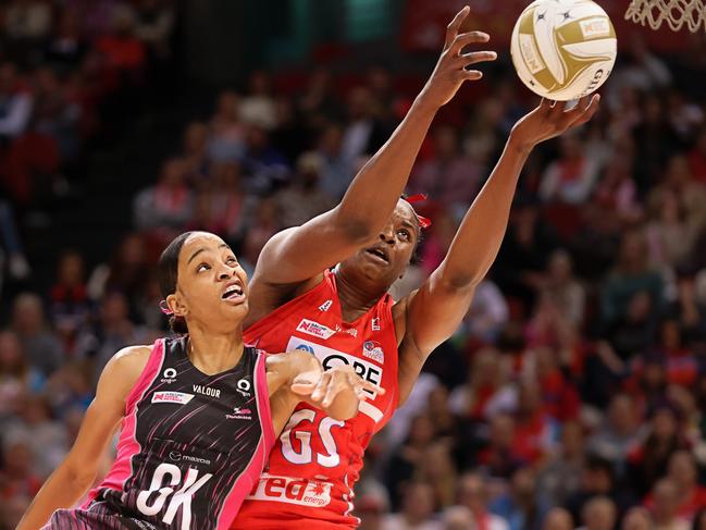 SYDNEY, AUSTRALIA - JUNE 24: Romelda Aiken-George of the Swifts reaches for the ball defended by Shamera Sterling of the Thunderbirds during the Super Netball Semi Final match between NSW Swifts and Adelaide Thunderbirds at Ken Rosewall Arena, on June 24, 2023, in Sydney, Australia. (Photo by Jenny Evans/Getty Images)