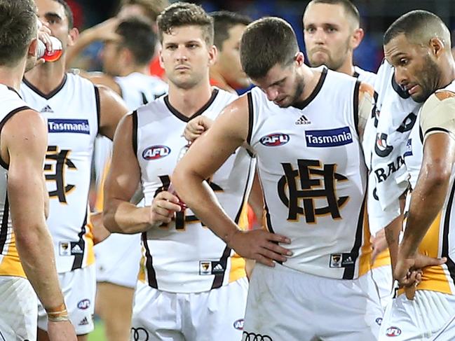 GOLD COAST, AUSTRALIA - APRIL 09:  Hawks leave the field after losing the round three AFL match between the Gold Coast Suns and the Hawthorn Hawks at Metricon Stadium on April 9, 2017 in Gold Coast, Australia.  (Photo by Chris Hyde/Getty Images)