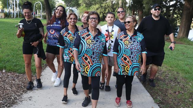 Aunty Bev Donovan with members of the Deadly Chicks walking group, Mareen Silleri, front right, and Frances Carr, front left, and family members at the Nepean River in Jamestown. Picture: John Feder/The Australian.