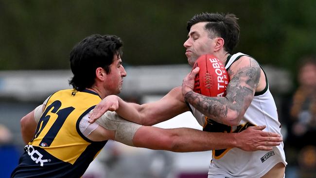 Sunny Brazier (left) in action for Hurstbridge. Picture: Andy Brownbill