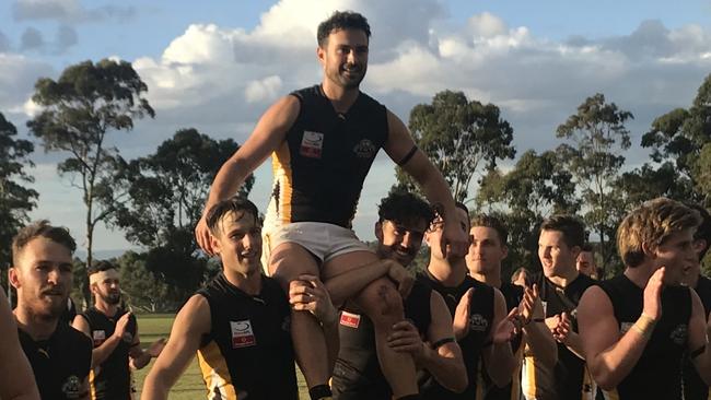 Rennie Gilchrist chaired off after his 150th game for Balwyn on Saturday. Picture: Supplied