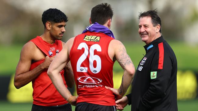 MELBOURNE, AUSTRALIA - JUNE 04: Ross Lyon, Senior Coach of the Saints speaks to Nasiah Wanganeen-Milera and Josh Battle of the Saints during a St Kilda Saints AFL training session at RSEA Park on June 04, 2024 in Melbourne, Australia. (Photo by Quinn Rooney/Getty Images)