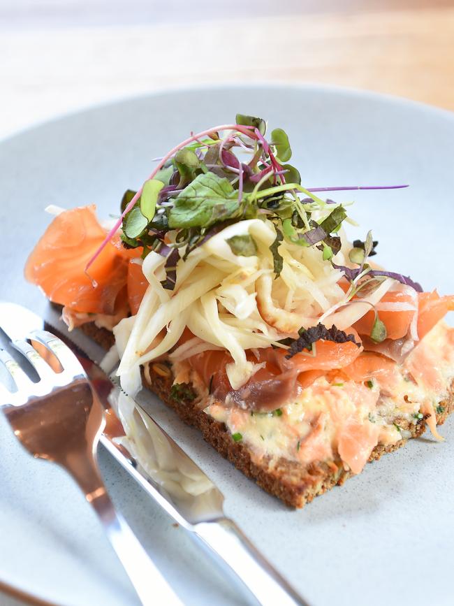 Rye bread topped with cured salmon, creme fraiche, daikon, fennel and shisho. Picture: Josie Hayden