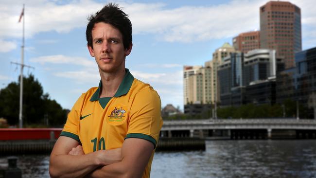 Socceroo Robbie Kruse beside the Yarra. Picture: Brendan Francis.