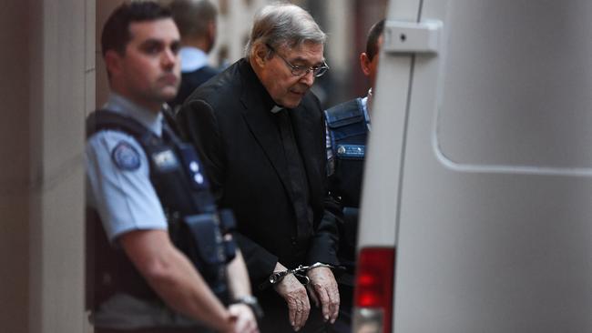 George Pell leaves the Supreme Court in handcuffs. Picture: AAP