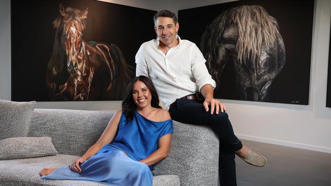 Billy and Nicole Slater in the gallery, with her paintings on display. Picture: David Caird