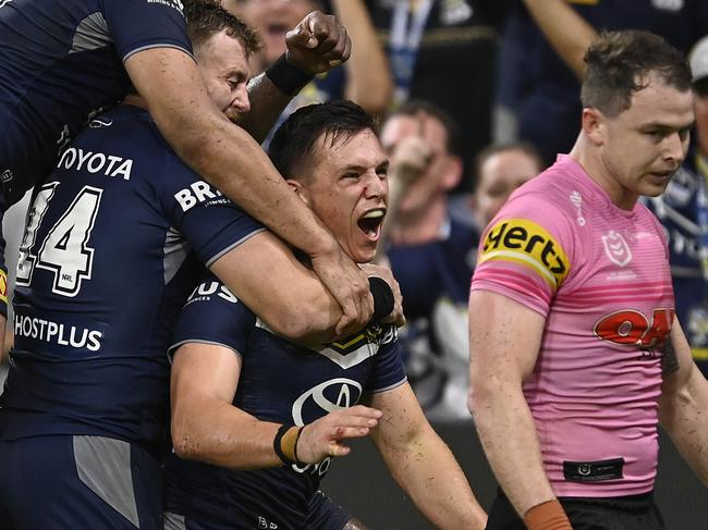 TOWNSVILLE, AUSTRALIA - JUNE 16: Scott Drinkwater of the Cowboys celebrates after scoring the winning try during the round 16 NRL match between North Queensland Cowboys and Penrith Panthers at Qld Country Bank Stadium on June 16, 2023 in Townsville, Australia. (Photo by Ian Hitchcock/Getty Images)