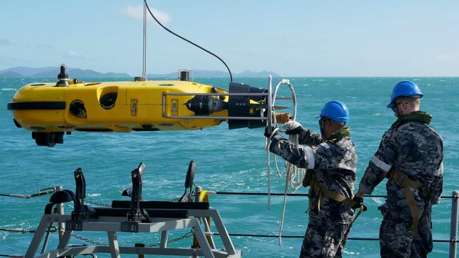 Royal Australian Navy sailors from HMAS Huon conduct search operations in the vicinity of Lindeman Island, Queensland, 30 July 2023.