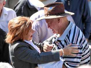 Bundamba MP Jo-Ann Miller comforts a man at the memorial service to commemorate the 47th anniversary of the Box Flat Mine disaster. Picture: Rob Williams