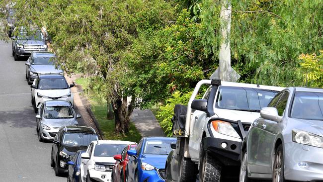 Drivers waited more than two hours to get a Covid test at the Ashgrove Baptist Church Car Park site on Thursday. Picture: John Gass