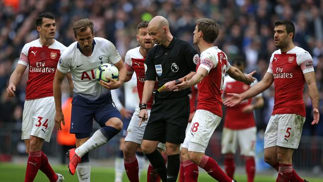 Referee Anthony Taylor indicates a penalty to Tottenham against Arsenal at Wembley. Picture: AFP