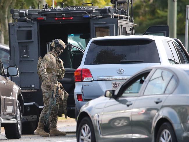 SERT bearcat has arrived at siege scene on Klingner Road, Redcliffe. Picture: Jono Searle