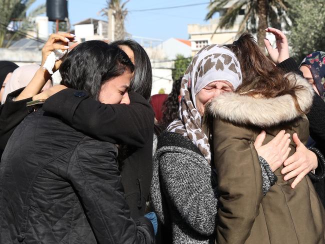 Aiia’s female relatives mourned with the women of their community. Picture: Ella Pellegrini