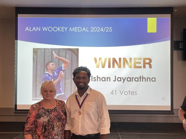 Ishan Jayarathna is presented with the DDCA's coveted Alan Wookey Medal by Alan's daughter Sue. Picture: Supplied.