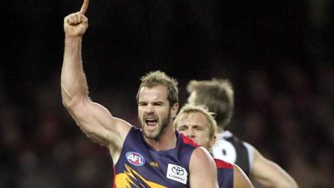 Captain Mark Ricciuto celebrates after kicking goal during St Kilda v Adelaide Crows AFL game at Telstra Dome in Melbourne.