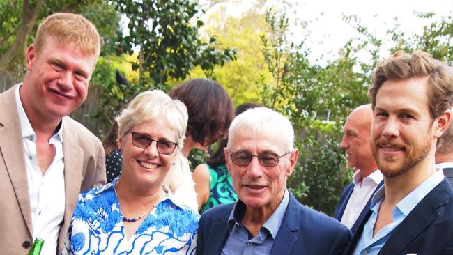 Bill and Debbie McMeniman, of Queenscliff, and their son Jono (far left) who are stuck on the Ocean Atlantic after an Antarctic cruise. Chris, right, is lobbying the Federal Government to help bring them home. Picture: Supplied