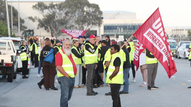 The Dandenong South distribution centre was meant to open at 6am; however, it remains blocked with a picket line of workers. Picture: NewsWire/ David Crosling