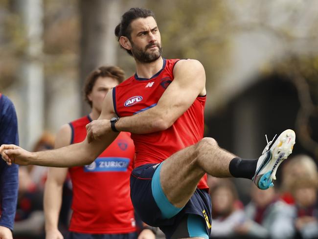 MELBOURNE, AUSTRALIA - SEPTEMBER 10: Brodie Grundy of the Demons kicks the ball during a Melbourne Demons AFL training session at Gosch's Paddock on September 10, 2023 in Melbourne, Australia. (Photo by Darrian Traynor/Getty Images)