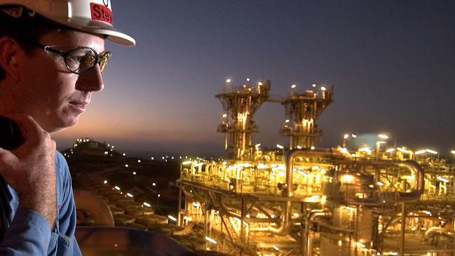 A worker at a Woodside oil plant.