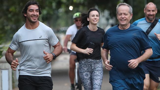 Bill Shorten with retired NRL player Jonathan Thurston on a morning run in Townsville. Picture: Kym Smith