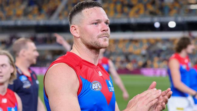 BRISBANE, AUSTRALIA - AUGUST 19: Steven May of the Demons acknowledges fans after the 2022 AFL Round 23 match between the Brisbane Lions and the Melbourne Demons at The Gabba on August 19, 2022 in Brisbane, Australia. (Photo by Russell Freeman/AFL Photos via Getty Images)
