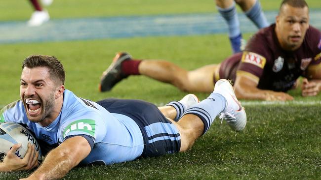 James Tedesco scores as Will Chambers looks on having made the earlier mistake. Pic: Michael Klein