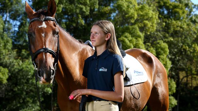 Nickola McNabb, 14, was the recipient of the Field Micro Screw in a world-first operation in Brisbane which will allow her to ride her horse Monte Carlo. Picture: Adam Head