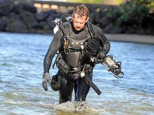 Police divers looking for evidence at Jack Evans boat harbour after a baby girl was found dead on a Gold Coast beach. Picture: AAP - John  Gass