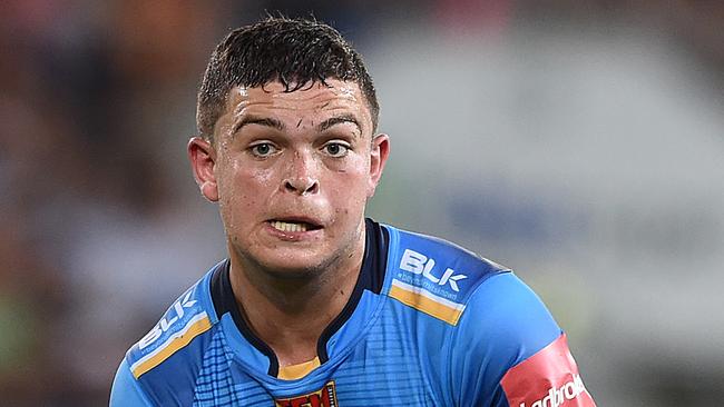 Titans player Ashley Taylor looks on during the Round 5 NRL match between the Gold Coast Titans and the Brisbane Broncos at CBUS Stadium on the Gold Coast, Friday, April 1, 2016. (AAP Image/Dave Hunt) NO ARCHIVING, EDITORIAL USE ONLY