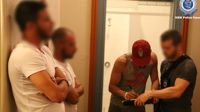 Two men were arrested at a hostel in Potts Point on Friday. 