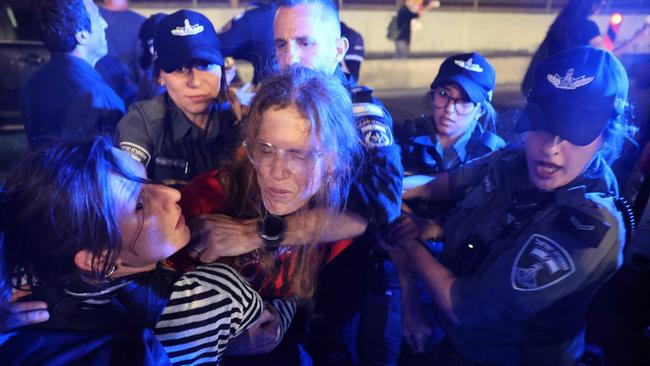 Israeli police disperse relatives and supporters of hostages as they block a road in Tel Aviv this week. Picture: AFP