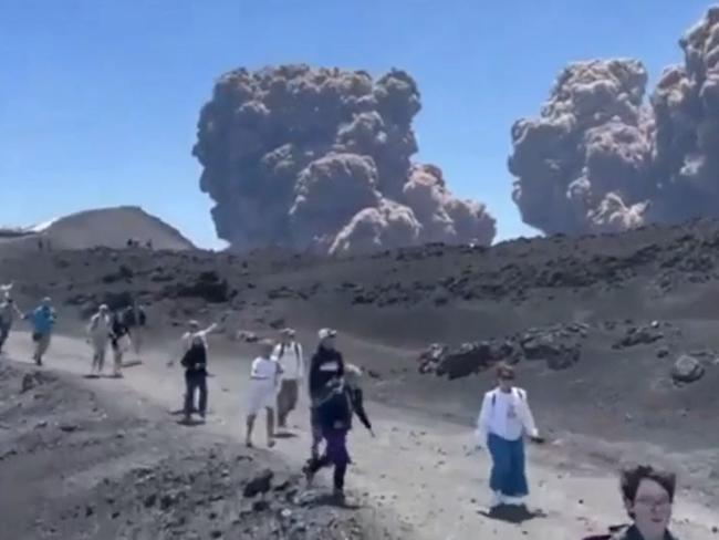 Tourist flee Mt Etna. Picture: Storyful.