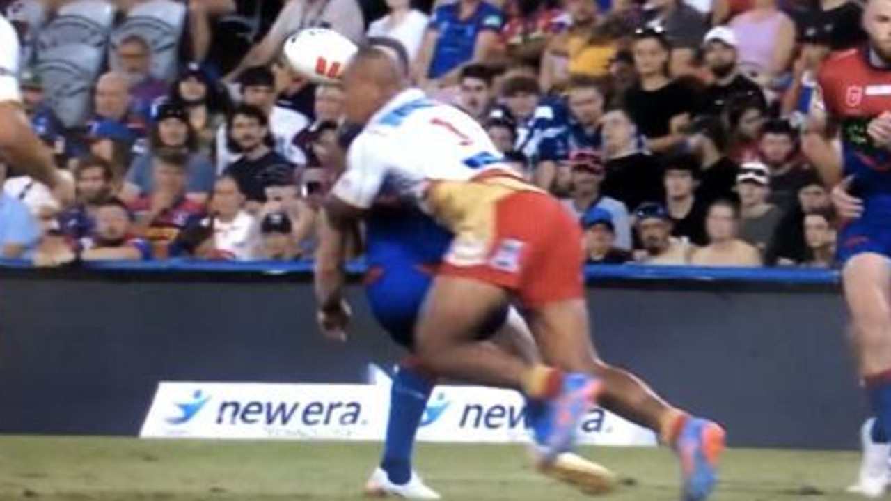 Felise Kaufusi hits Jackson Hastings late.