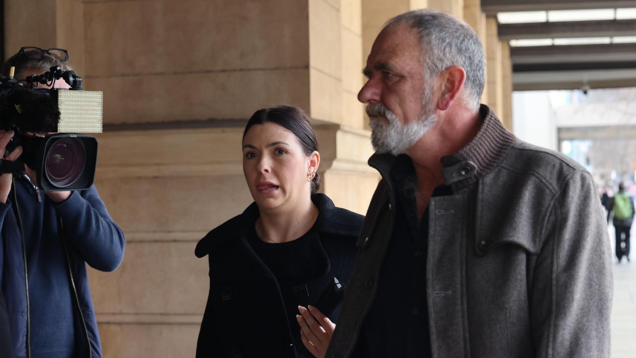 Lauren Willgoose, centre, leaves court after an earlier appearance. Picture: Russell Millard