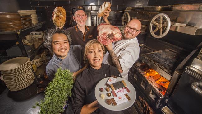 Bendigo chefs Laurie Whelan of The Good Loaf, Bob Yam of Malayan Orchid, Hayley Tibbett of Indulge Chocolates and Paul Pitcher of The Woodhouse celebrate the UN recognition. Picture: Rob Leeson