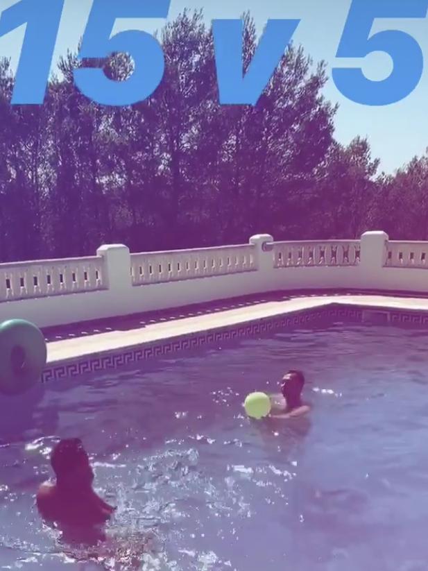 Thorpe competing against a friend in the pool while on holiday in Ibiza. Picture: Instagram @ryanchanning