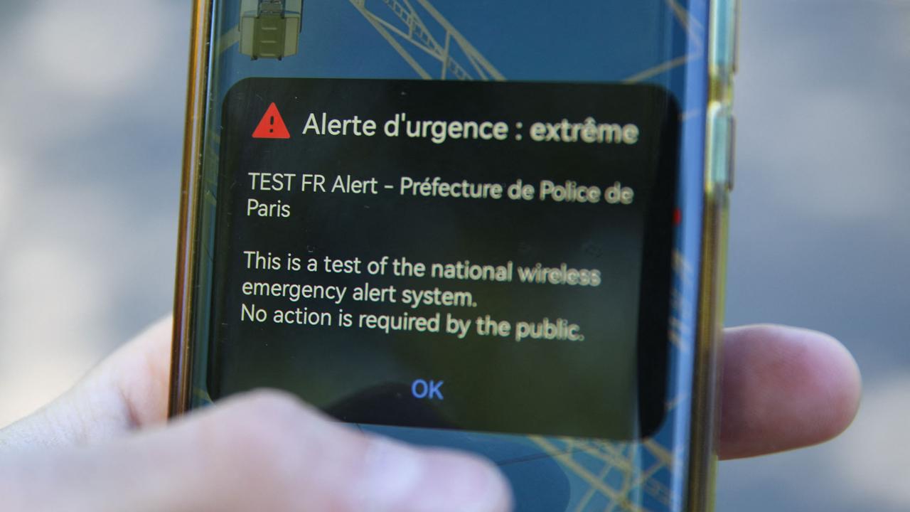 An emergency alert message from police in Paris. FR-Alert is a new disaster alert system which alerts people’s phones in real time to their presence in a danger zone, informing them of the behaviour they should adopt to protect themselves. Picture: Antonin UTZ / AFP