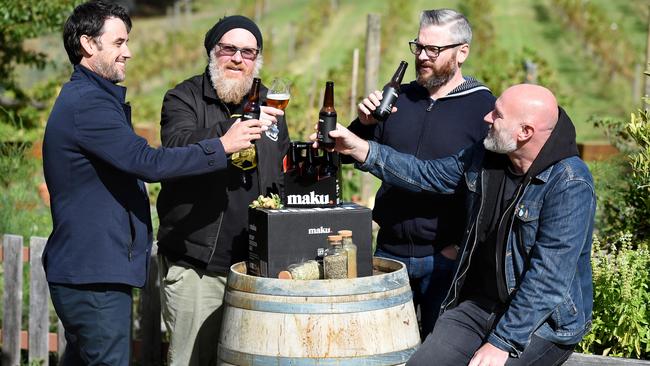 Adam Guskich, Dale White, Michael Smith, and Todd McClellan are toasting their success with a new fusion beer mixing hemp and hops. Picture: Steve Tanner