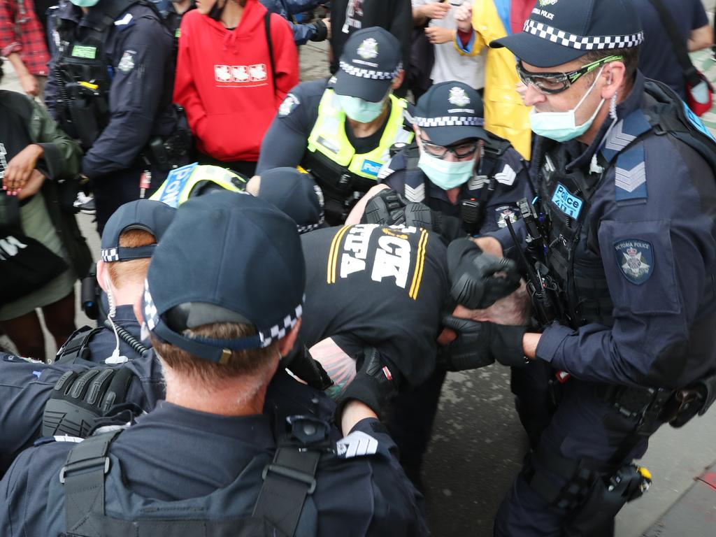 The man dragged away by police. Picture: NCA NewsWire/ David Crosling