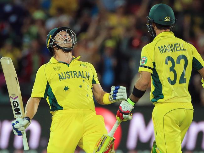 Watson celebrates with Glenn Maxwell after hitting the winning runs against Pakistan.