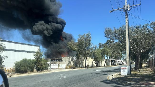 Fire crews were alerted to the blaze at Wingfield about 1pm on Tuesday with reports about 40 vehicles were on fire in a scrap metal yard. Picture: Facebook