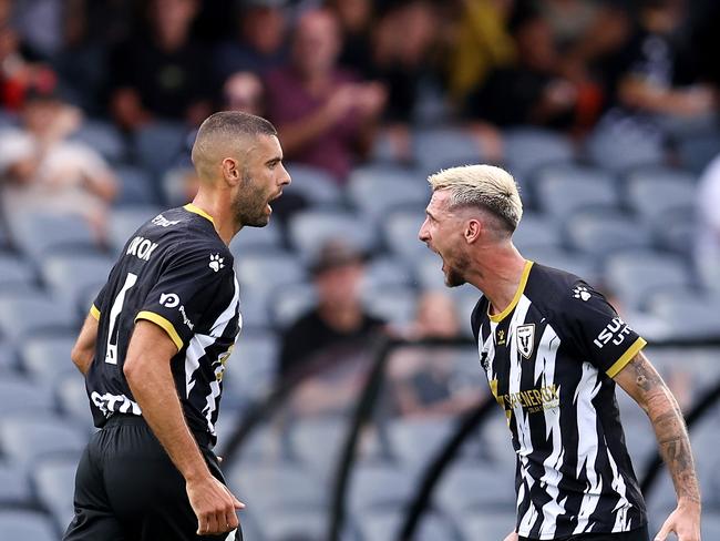 SYDNEY, AUSTRALIA - FEBRUARY 09: Martin Jakolis of the Bulls celebrates scoring a goal with team mate Tomislav Uskok during the round 18 A-League Men match between Macarthur FC and Western United at Campbelltown Stadium, on February 09, 2025, in Sydney, Australia. (Photo by Brendon Thorne/Getty Images)